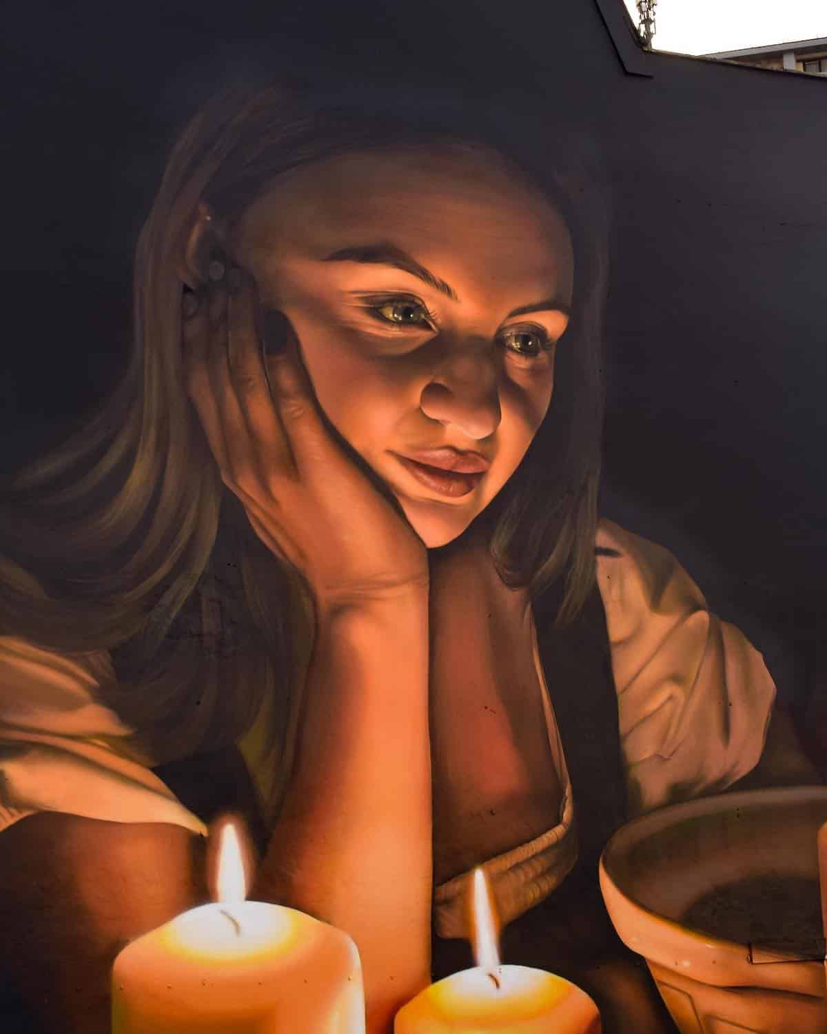 Mural of a Girl With Candles by Elle Koziupa