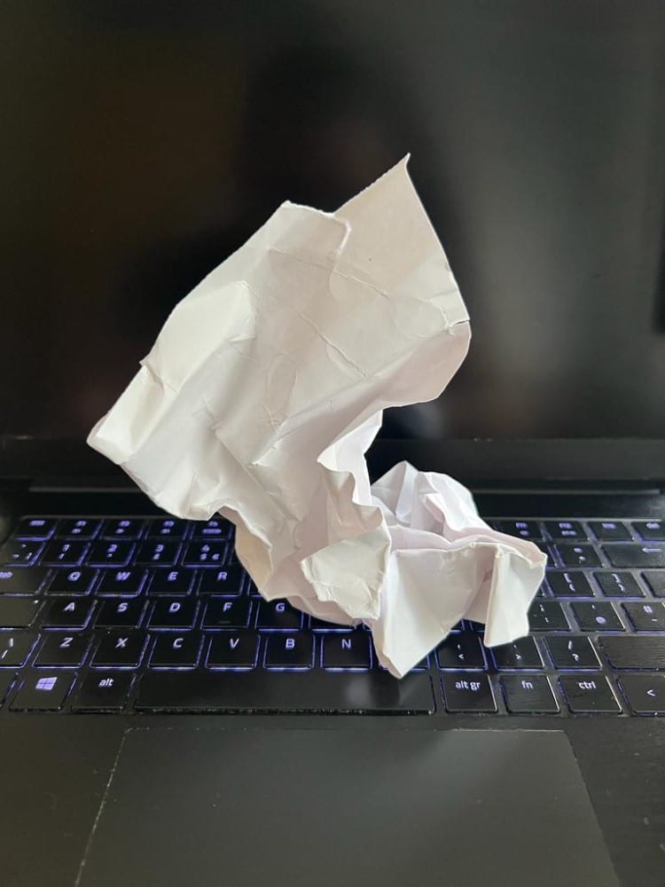 Crumpled Paper on a Computer